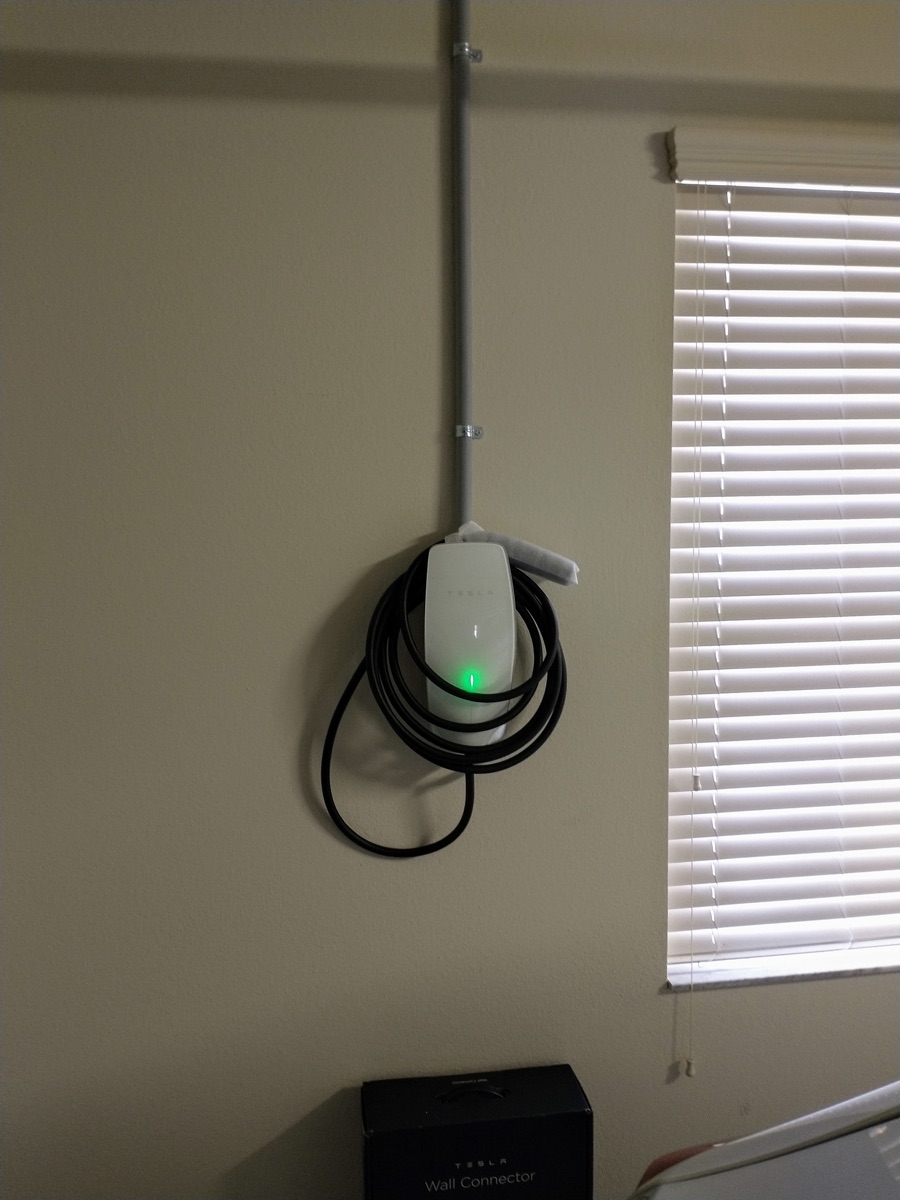 Home EV charger installed in a Christchurch garage